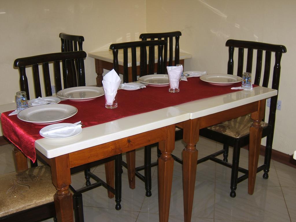Milimani Holiday Resort Kisumu Bilik gambar